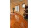 Bright living room featuring hardwood floors and a fireplace at 3230 Osceola St, Denver, CO 80212