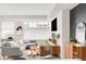 Inviting living room with stylish decor, comfortable seating, and modern entertainment setup at 1238 Quitman St # 2, Denver, CO 80204
