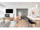 Stylish open-concept living and kitchen space with a modern design and upscale features at 1238 Quitman St # 2, Denver, CO 80204