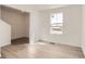 Inviting living room featuring luxury vinyl plank flooring, and natural light at 3919 N Shawnee St, Aurora, CO 80019