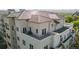 Aerial view showcasing building's architecture and private rooftop patio at 2200 S University Blvd # 513, Denver, CO 80210