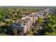 Aerial view of apartment building near a tree-lined street at 2200 S University Blvd # 513, Denver, CO 80210