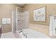 Elegant bathroom with soaking tub and shower at 2200 S University Blvd # 513, Denver, CO 80210