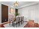 Elegant dining area featuring hardwood floors and a contemporary table setting at 2200 S University Blvd # 513, Denver, CO 80210