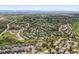 An aerial view showcases this neighborhood's layout, landscaping, and surrounding community at 7367 S Tempe Ct, Aurora, CO 80016