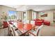 Bright dining room with large windows, view, and access to an outdoor space at 7367 S Tempe Ct, Aurora, CO 80016
