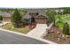 Beautiful two-story home featuring manicured landscaping and a spacious driveway at 7367 S Tempe Ct, Aurora, CO 80016