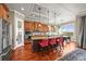 Gourmet kitchen features granite countertops, stainless steel appliances, and a center island at 7367 S Tempe Ct, Aurora, CO 80016