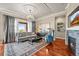 Bright living room showcasing elegant decor, fireplace, and large windows at 7367 S Tempe Ct, Aurora, CO 80016