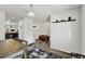 Bright dining area with wood floors, neutral walls, and a window, perfect for Gathering meals and entertaining guests at 47349 Lily Ave, Bennett, CO 80102