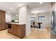 Kitchen island with granite countertops and built-in microwave at 1551 N Larimer St # 2504, Denver, CO 80202