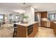 Modern kitchen with granite island and stainless steel appliances at 1551 N Larimer St # 2504, Denver, CO 80202