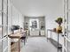 Bright home office with modern decor, built in shelves, and plenty of natural light at 10770 Hillrose St, Parker, CO 80134