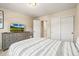 Spacious bedroom with a TV and built-in wardrobe at 2866 Low Meadow Blvd, Castle Rock, CO 80109