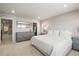 Main bedroom with king-size bed and dresser at 2866 Low Meadow Blvd, Castle Rock, CO 80109