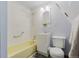 Bathroom with tub and shower combo, vanity, and toilet at 8691 S Warhawk Rd, Conifer, CO 80433