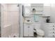 Bright bathroom featuring a modern vanity, tiled shower, and updated fixtures for a clean, stylish look at 8691 S Warhawk Rd, Conifer, CO 80433