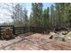 Spacious wooden deck with lovely natural scenery, ideal for outdoor relaxation and enjoying the peaceful surroundings at 8691 S Warhawk Rd, Conifer, CO 80433