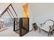 Cozy upper hallway featuring seating area at 8691 S Warhawk Rd, Conifer, CO 80433
