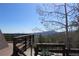 Scenic view from deck showcasing mountains and lush greenery at 8691 S Warhawk Rd, Conifer, CO 80433