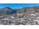 Aerial view of a small town surrounded by mountains in winter at 110 Oakdale Dr, Palmer Lake, CO 80132