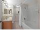 Clean bathroom with a bathtub and double vanity at 110 Oakdale Dr, Palmer Lake, CO 80133