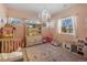 Pastel-colored bedroom with plenty of storage at 110 Oakdale Dr, Palmer Lake, CO 80133