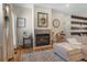 Living room fireplace with decorative mantel and clock at 110 Oakdale Dr, Palmer Lake, CO 80133