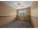 Bedroom with a ceiling fan and a window with natural light at 16185 Willowstone St, Parker, CO 80134