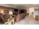 Cozy basement featuring a large entertainment center and leather seating at 10640 W 46Th Ave, Wheat Ridge, CO 80033