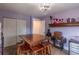 Bright room featuring a craft table, sewing machine, and ample closet space at 10640 W 46Th Ave, Wheat Ridge, CO 80033