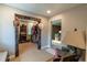 Spacious walk-in closet with built-in shelving and ample storage space, framed by rustic wood at 10640 W 46Th Ave, Wheat Ridge, CO 80033