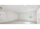 Bright bedroom featuring recessed lighting, neutral carpet, and a large window at 4046 N Irvington St, Aurora, CO 80019