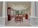 Formal dining room with coffered ceilings and elegant wood furniture at 16361 Parkside Dr, Parker, CO 80134