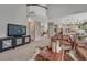 Large living room with high ceilings, open layout, and views to the eat-in kitchen at 16361 Parkside Dr, Parker, CO 80134