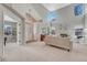 Bright living room boasts vaulted ceilings, large windows, fireplace, and neutral decor at 16361 Parkside Dr, Parker, CO 80134