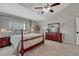 Spacious main bedroom with a vaulted ceiling, large window, and well-appointed furnishings at 16361 Parkside Dr, Parker, CO 80134