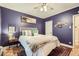 Cozy bedroom with modern decor, plush bedding, and stylish accents at 963 N Logan St # 11, Denver, CO 80203