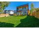 Landscaped backyard, offering a view of the home's exterior at 3485 S Clermont St, Denver, CO 80222