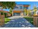 Modern home with a sleek design and a driveway at 3485 S Clermont St, Denver, CO 80222