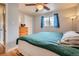 Bedroom with hardwood floors, natural lighting, and ample space at 12235 E Kentucky Ave, Aurora, CO 80012
