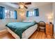 Comfortable bedroom with natural light and hardwood floors at 12235 E Kentucky Ave, Aurora, CO 80012