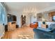 Bright living room with hardwood floors and open floor plan at 12235 E Kentucky Ave, Aurora, CO 80012
