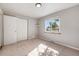 Well-lit bedroom with closet and window at 3100 Gray St, Denver, CO 80214