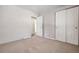 Bedroom with brick accent wall and double closet at 3100 Gray St, Denver, CO 80214