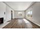 Spacious living room featuring hardwood floors and large windows at 3100 Gray St, Denver, CO 80214