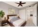 A beautifully furnished bedroom with a neutral palette, closet, and view of a fireplace at 1231 S Crystal Way, Aurora, CO 80012
