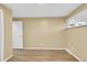 This bedroom features modern vinyl flooring, neutral colored walls and a window at 2978 Robb Cir, Lakewood, CO 80215