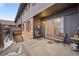 Small back patio with sliding glass door access at 3855 S Monaco St # 176, Denver, CO 80237