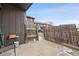 Private back patio with wooden fence and gate at 3855 S Monaco St # 176, Denver, CO 80237